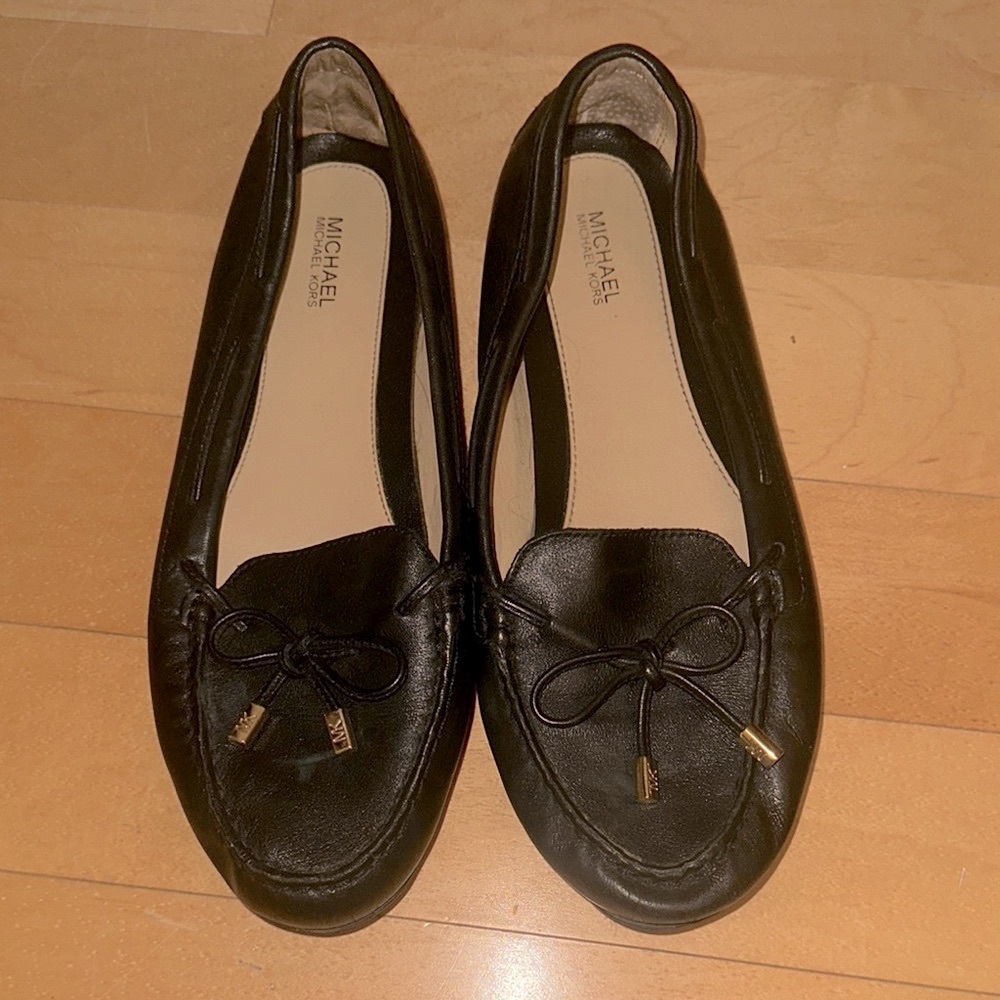 Michael Kors Black Flats Sleek and Versatile
